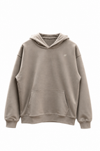 Built For oversized hoodie zand met zwarte opdruk, voorkant